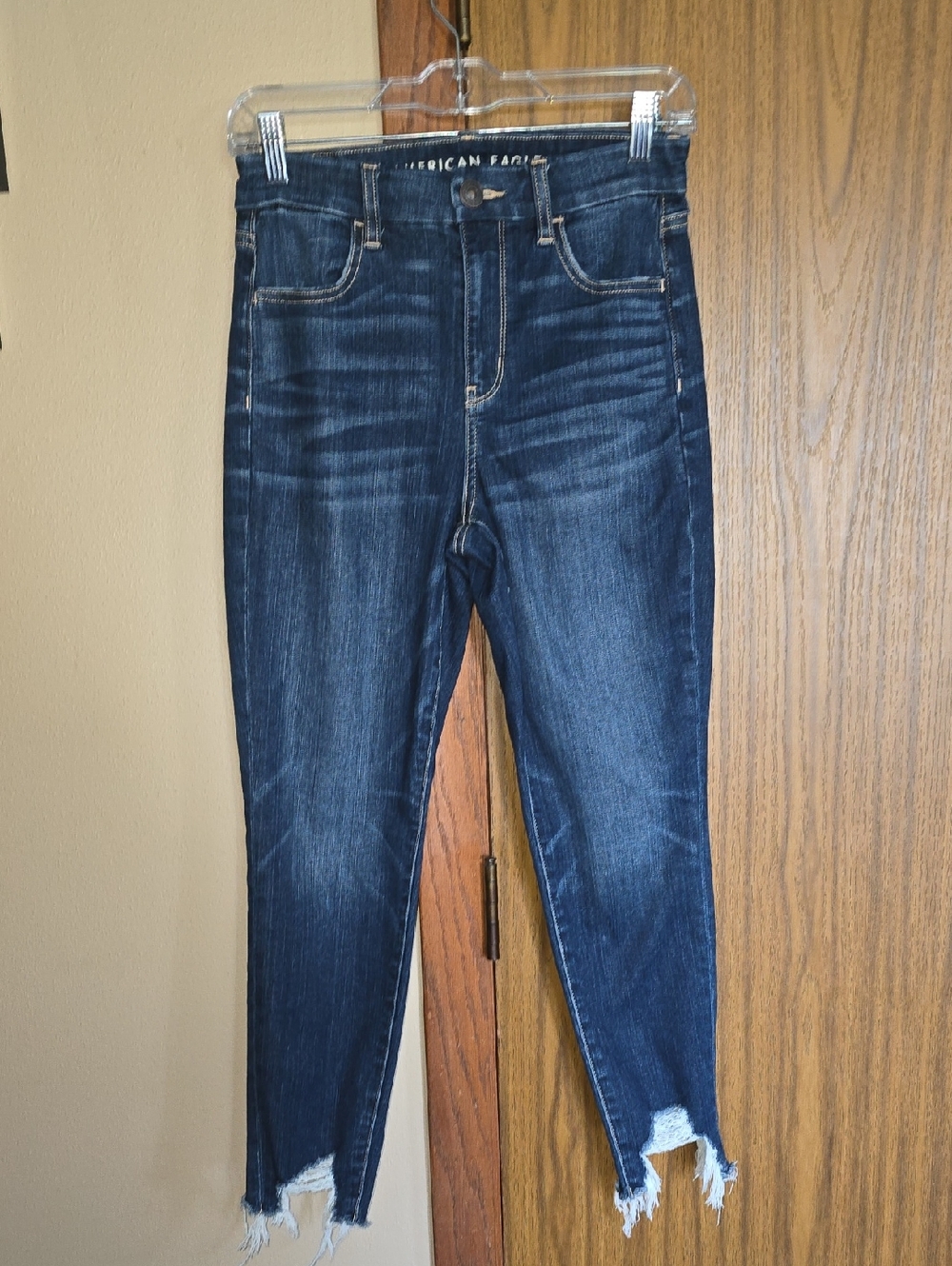 American Eagle Outfitters Indigo High-Rise Skinny Jeans with Distressed Hem